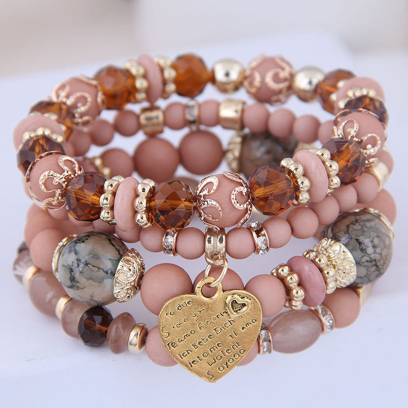 Ensemble de 4 bracelets multirangs rose poudré et marron avec perles, détails dorés et pendentif cœur