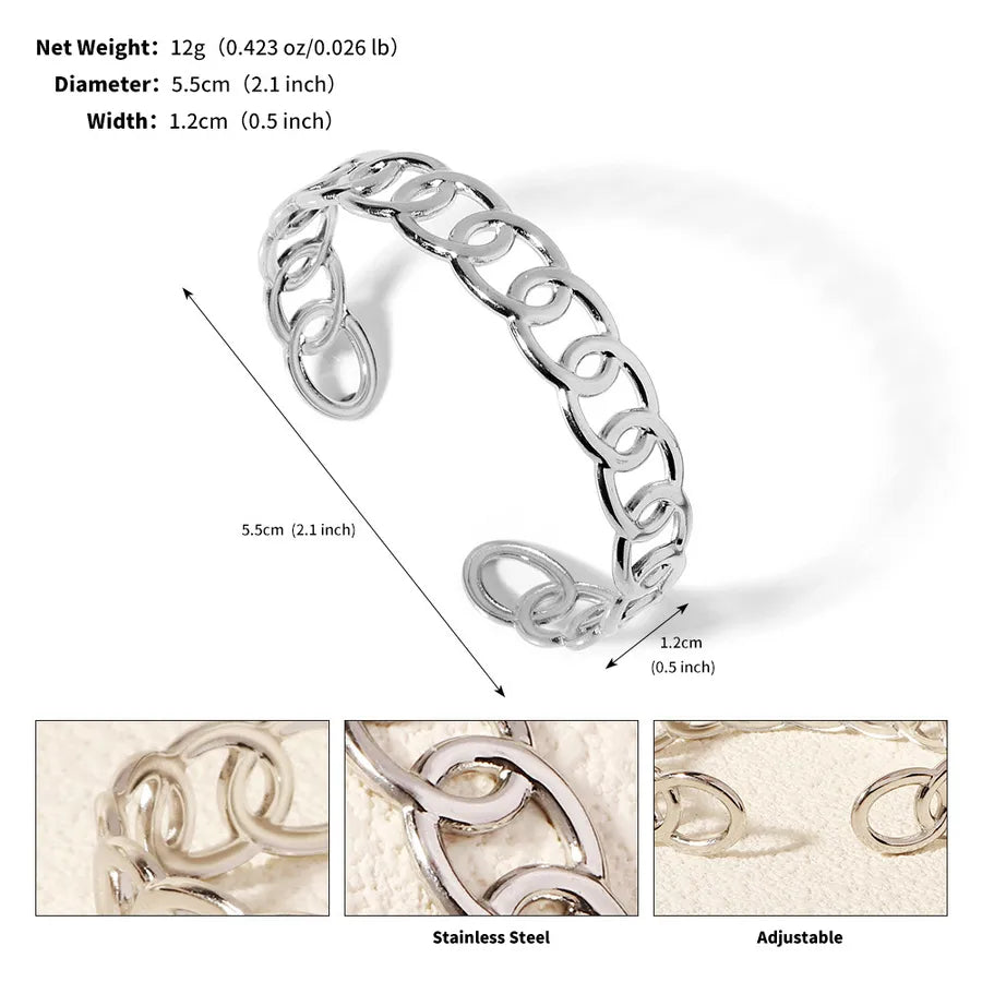 Bracelet manchette argenté ouvert à maillons ovales entrelacés ; l’image indique 5,5 cm de diamètre et 1,2 cm de largeur