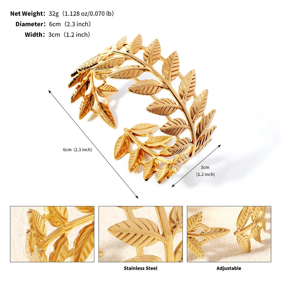 Bracelet manchette doré ajustable à motifs de feuilles ; l’image indique 6 cm de diamètre et 3 cm de largeur