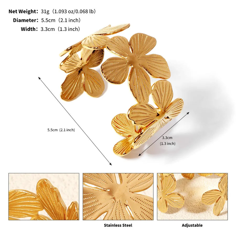 Bracelet manchette doré ajustable à fleurs à cinq pétales ; l’image indique 5,5 cm de diamètre et 3,3 cm de largeur